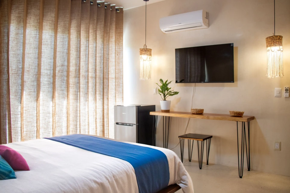 Comfortable bedroom with TV